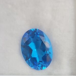 Vibrant Blue Topaz Oval Gemstone